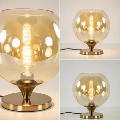 Outlet Straluma Elegante tafellamp donker goud met amber glazen bol 25 cm