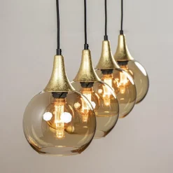 Hot Straluma 4-Lichts eettafelhanglamp zwart/goud met amber glazen bollen