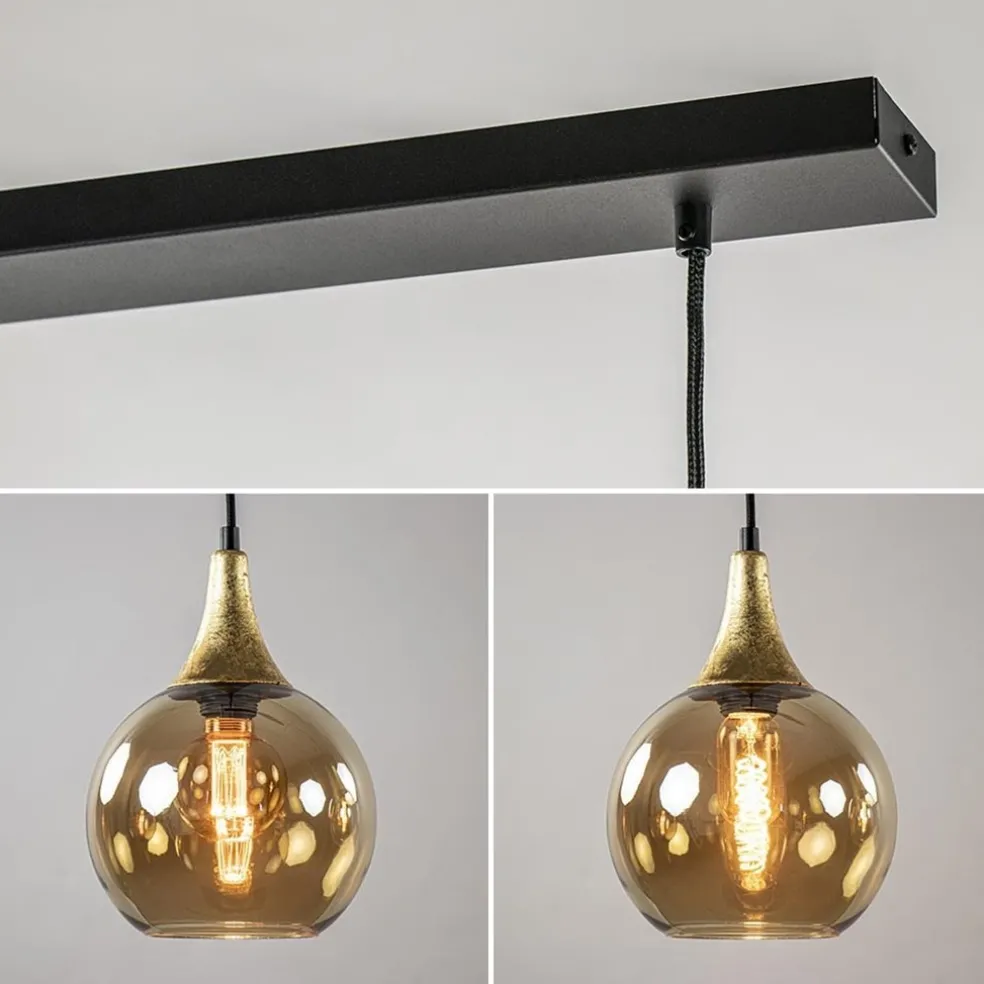 Hot Straluma 4-Lichts eettafelhanglamp zwart/goud met amber glazen bollen