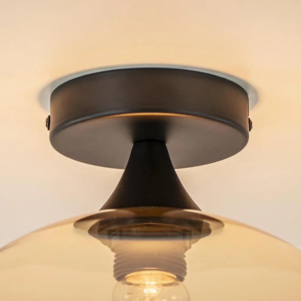Hot Straluma Mat zwarte plafondlamp met amber glazen bol 30 cm