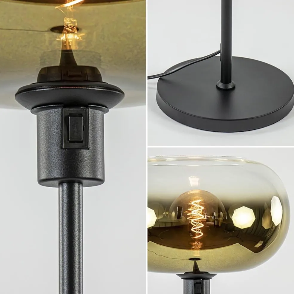 Outlet Straluma Mat zwarte vloerlamp met glazen kap helder/goud
