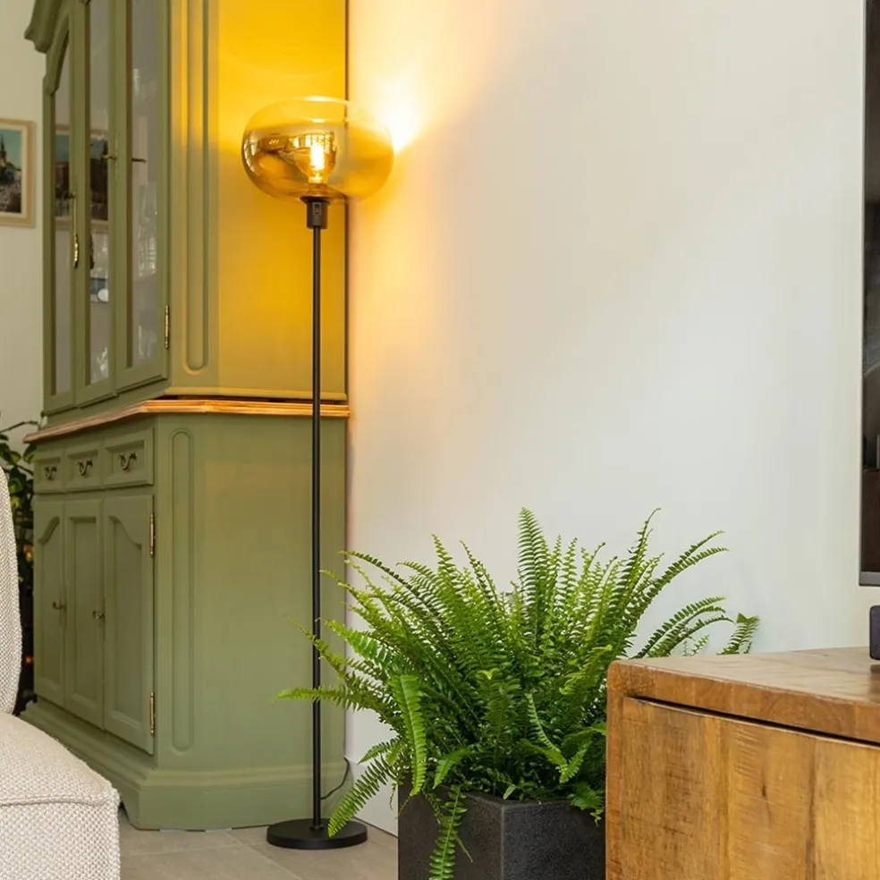 Outlet Straluma Mat zwarte vloerlamp met glazen kap helder/goud